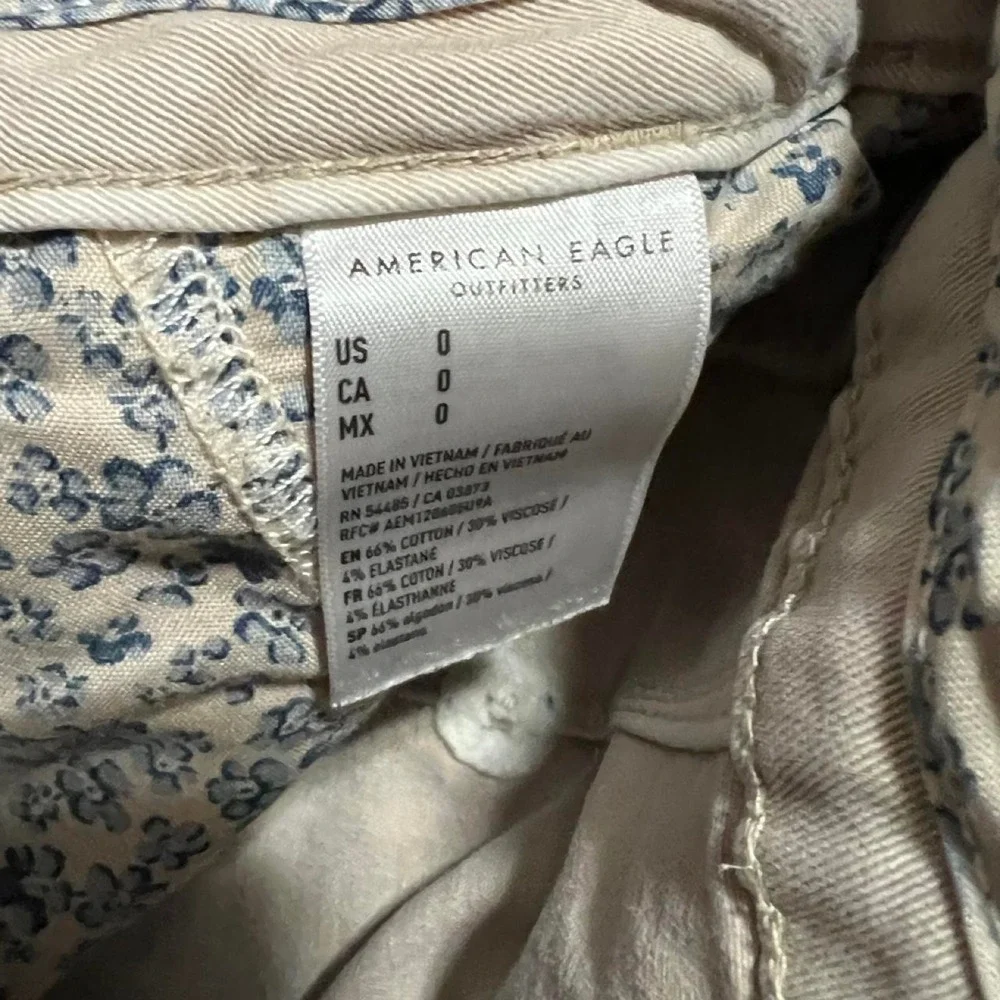 American Eagle Outfitters cream shorts with blue floral pattern 323.5